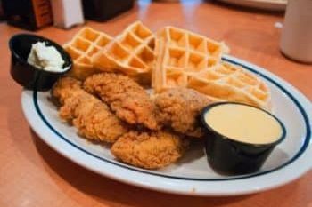chicken and waffles on plate