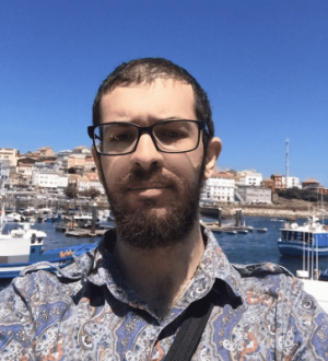 Student selfie in front of dock in europe