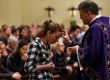 Priests applying ashes to forehead